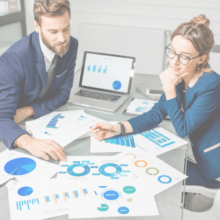 looking-at-reports-on-desk-for-Capital-Gain-Tax-artifin-accountants
