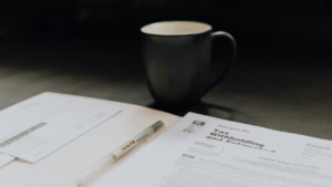 capital gains tax form with coffee mug next to it