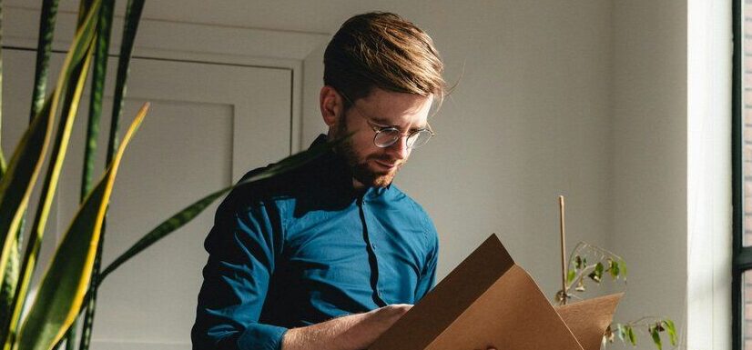 man-reading-a-file-scaled down